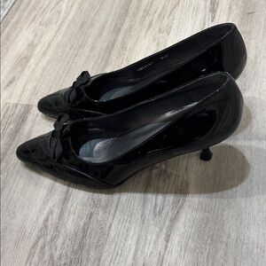 Stuart Weitzman black patent leather  9.5 point toe shoes